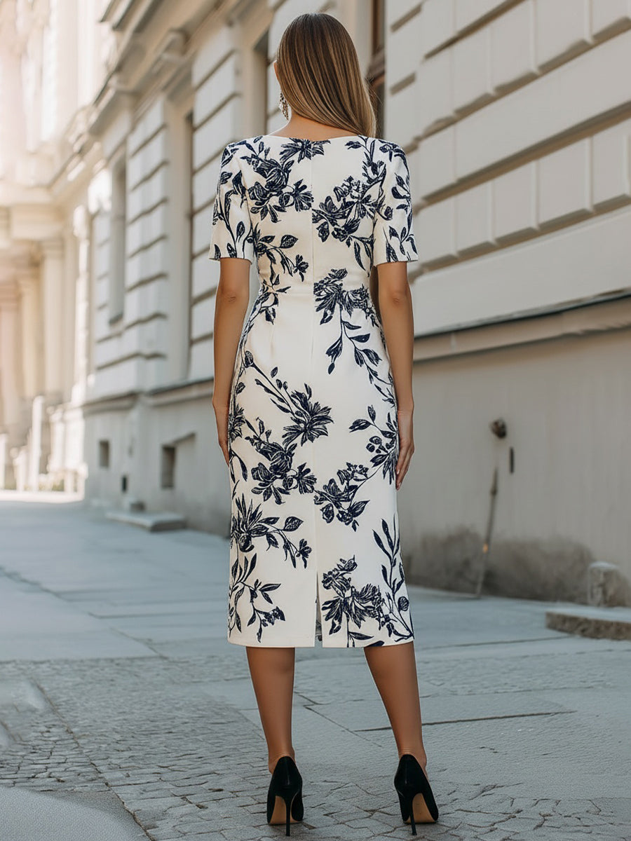 Midi dress with short sleeves and a botanical print